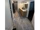 This bathroom includes a granite countertop, double vanity, and large walk-in shower at 4430 Kings Hwy, Douglasville, GA 30135