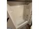 Clean bathroom with white tile tub/shower combination and modern fixtures for comfort at 4430 Kings Hwy, Douglasville, GA 30135