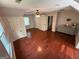 Bedroom featuring a ceiling fan, window, and hardwood floors, complemented by natural light at 4430 Kings Hwy, Douglasville, GA 30135