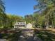 Charming home featuring a welcoming front porch and a convenient two-car garage at 4430 Kings Hwy, Douglasville, GA 30135