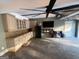 Spacious garage with custom cabinets, shelving and modern ceiling fan at 4430 Kings Hwy, Douglasville, GA 30135