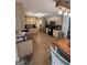 Large kitchen with tile floors, wooden cabinets, modern appliances and plenty of counter space and dining area at 4430 Kings Hwy, Douglasville, GA 30135