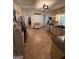 Open kitchen layout featuring tile floors, wooden cabinets and modern appliances, with ample counter space at 4430 Kings Hwy, Douglasville, GA 30135