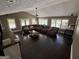 Cozy living room with vaulted ceiling, fan, and many windows at 4430 Kings Hwy, Douglasville, GA 30135