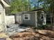 A detached outbuilding with a convenient entrance for lawn and garden tools at 4430 Kings Hwy, Douglasville, GA 30135
