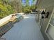 An inviting backyard with a sparkling pool and a deck overlooking the serene landscape at 4430 Kings Hwy, Douglasville, GA 30135