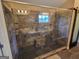 Modern bathroom features large walk-in shower with tile surround, black trim and glass doors at 1007 Oglethorpe Ct, Woodstock, GA 30188
