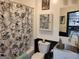 Cozy bathroom with unique bicycle-themed shower curtain and decor adds a touch of personality at 1007 Oglethorpe Ct, Woodstock, GA 30188
