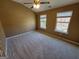 Inviting bedroom with natural light from two windows creates a cozy and comfortable atmosphere at 1007 Oglethorpe Ct, Woodstock, GA 30188