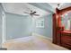 Bedroom with built-in drawers and neutral carpet at 482 E Lake Rd, Mcdonough, GA 30252