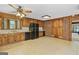 Eat in kitchen with tile flooring, ample counter space, and wood cabinets at 482 E Lake Rd, Mcdonough, GA 30252