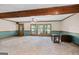 Cozy living room featuring carpet flooring and ample natural light at 482 E Lake Rd, Mcdonough, GA 30252