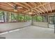 Spacious patio with wood ceiling and views of the backyard at 482 E Lake Rd, Mcdonough, GA 30252