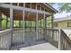 Spacious patio with wood ceiling and views of the backyard at 482 E Lake Rd, Mcdonough, GA 30252