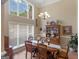 Formal dining room featuring a large window and natural lighting at 225 Suffolk Way, Mcdonough, GA 30252