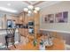 Charming kitchen with light wood cabinetry, breakfast bar, and modern appliances at 225 Suffolk Way, Mcdonough, GA 30252