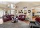 Cozy living room with hardwood floors, tall ceilings and ample natural light at 225 Suffolk Way, Mcdonough, GA 30252