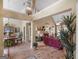 Spacious living room featuring hardwood floors, chandelier, and elegant furnishings at 225 Suffolk Way, Mcdonough, GA 30252