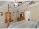 This main bedroom features tray ceilings and ornate wooden furniture, providing a luxurious retreat at 225 Suffolk Way, Mcdonough, GA 30252