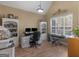 Office features light filled room, hardwood floors, dual monitors and built-in shelves at 225 Suffolk Way, Mcdonough, GA 30252