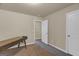 Bedroom featuring neutral walls, carpet, closet and a desk at 820 Lake Chase, Fairburn, GA 30213