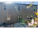 A well-maintained home exterior with a sliding door and ample natural light from the windows at 820 Lake Chase, Fairburn, GA 30213