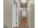 Neutral hallway featuring carpet flooring and white trim at 820 Lake Chase, Fairburn, GA 30213