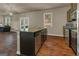 Well-equipped kitchen with granite countertops, stainless steel appliances, and breakfast bar seating at 820 Lake Chase, Fairburn, GA 30213