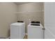 Laundry room with washer and dryer at 820 Lake Chase, Fairburn, GA 30213