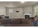 A living room with hardwood floors, fireplace and furniture at 820 Lake Chase, Fairburn, GA 30213
