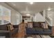 Spacious living room with hardwood floors that opens to the kitchen, bright and airy at 820 Lake Chase, Fairburn, GA 30213