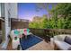Inviting back deck featuring stylish outdoor furniture, perfect for entertaining or relaxing in nature at 3028 Pruitt Ln, Smyrna, GA 30080
