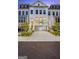Beautiful townhome complex with a garage, landscaping, and a modern exterior design at 3028 Pruitt Ln, Smyrna, GA 30080