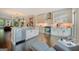 Kitchen with an island, stainless steel appliances, and an open-concept design at 3028 Pruitt Ln, Smyrna, GA 30080