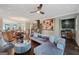 Inviting living room with hardwood floors, comfortable seating, and a view to the dining area at 3028 Pruitt Ln, Smyrna, GA 30080