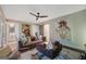 Cozy living room boasts stylish furnishings, contemporary art, and access to an ensuite bathroom at 3028 Pruitt Ln, Smyrna, GA 30080
