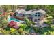 Lush backyard oasis with pool, patio, mature trees, and an outdoor entertainment area, providing an inviting retreat at 8655 Shoreline Dr, Jonesboro, GA 30236
