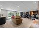 Finished basement offering a comfortable seating area and desk space with scenic lake views at 8655 Shoreline Dr, Jonesboro, GA 30236