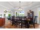 Stately dining room featuring water views and ample space for entertaining at 8655 Shoreline Dr, Jonesboro, GA 30236