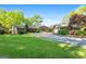 Charming home with manicured lawn, stone accents, and a welcoming entrance, perfect for Gathering living and entertaining at 8655 Shoreline Dr, Jonesboro, GA 30236