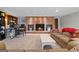 Spacious living room features a brick fireplace, built-in bookshelves, and a comfortable seating area at 8655 Shoreline Dr, Jonesboro, GA 30236