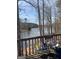 Relaxing deck overlooking the lake, furnished with colorful chairs at 2467 Highway 138 Sw, Conyers, GA 30094