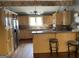 Kitchen with stainless steel appliances, countertop seating, and natural lighting at 2467 Highway 138 Sw, Conyers, GA 30094
