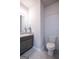 Stylish half bath with white subway tiles, hexagon accent tiles and modern vanity at 101 Greenfield Ln, Grantville, GA 30220