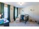 Beautiful Bedroom with black iron crib, neutral walls, and elegant sconce lighting at 101 Greenfield Ln, Grantville, GA 30220