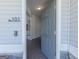 Bright entryway with hardwood floors, white trim, and a view into the home's interior at 101 Greenfield Ln, Grantville, GA 30220