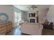 Cozy living room with fireplace, hardwood floors, and natural light at 101 Greenfield Ln, Grantville, GA 30220