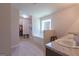 Bright main bathroom featuring a separate shower, soaking tub, and a walk-in closet at 101 Greenfield Ln, Grantville, GA 30220