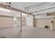 Unfinished basement features ample space, storage cabinets, and columns at 106 Gateway Pt, Peachtree City, GA 30269