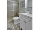Updated bathroom featuring a shower and patterned tile flooring at 106 Gateway Pt, Peachtree City, GA 30269